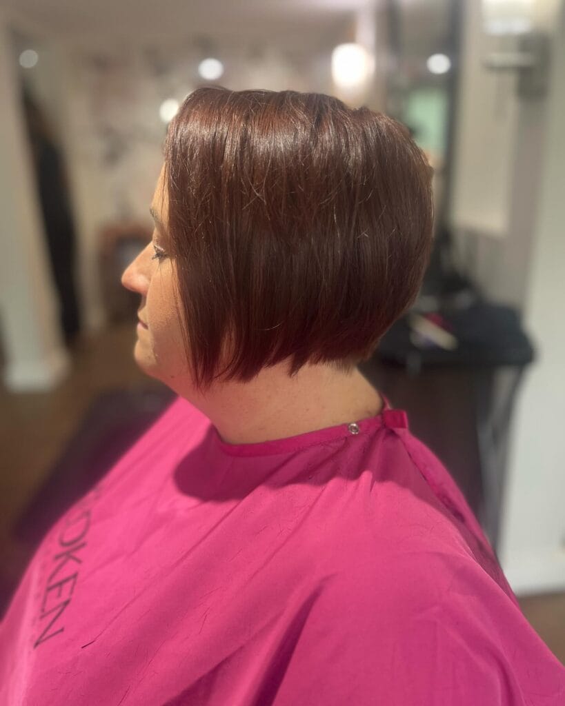 Classic brunette inverted bob with a stacked back and longer front framing the face.