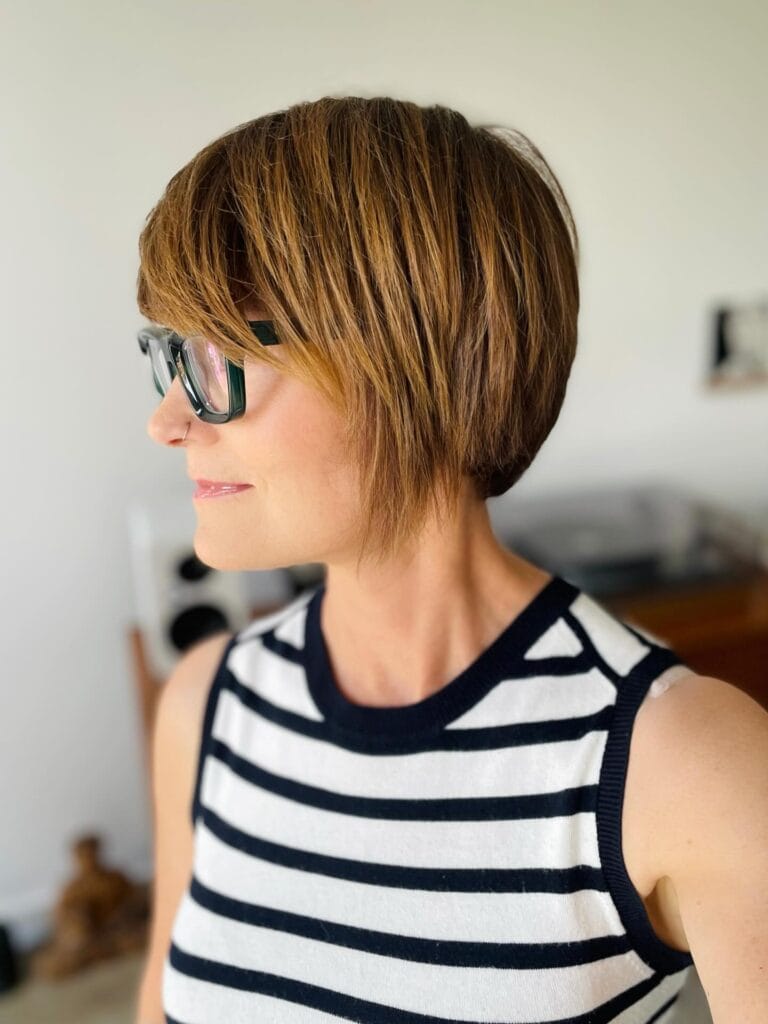 Short angled layered bob with a sleek smooth finish.
