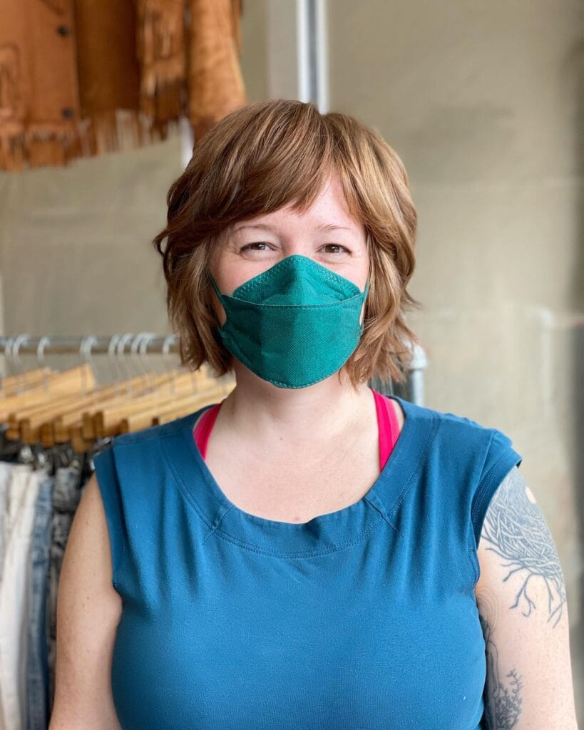 Short layered shaggy bob haircut with soft volume and textured layers.