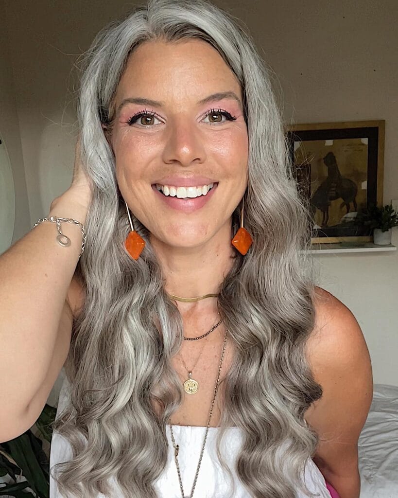 Long straight gray hair with a sleek smooth finish.