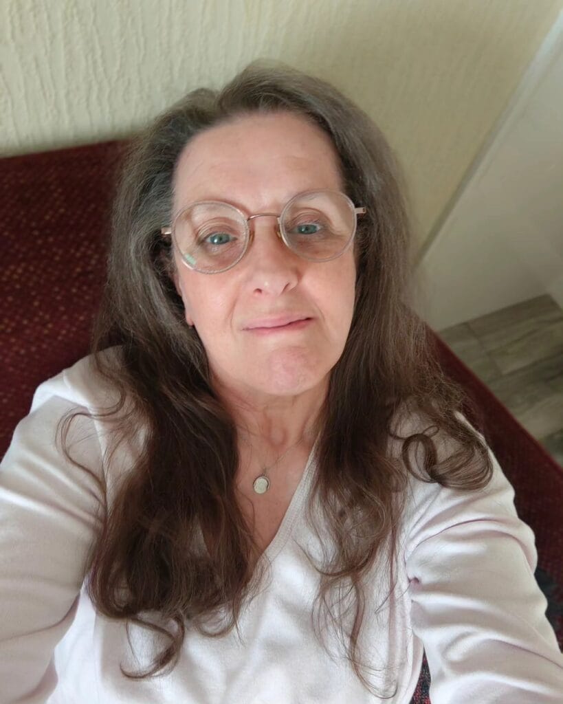 Long brown hair with soft layers and natural volume styled in a relaxed everyday look.