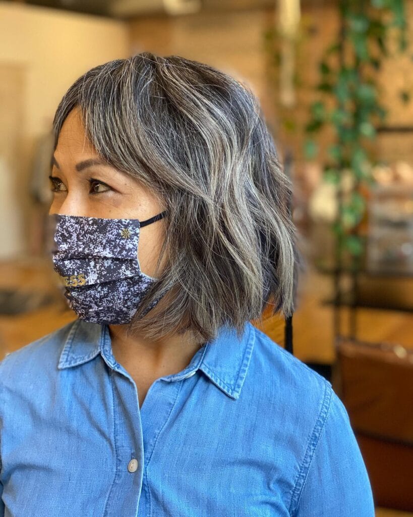 Wavy gray bob with soft natural texture and subtle layered movement.