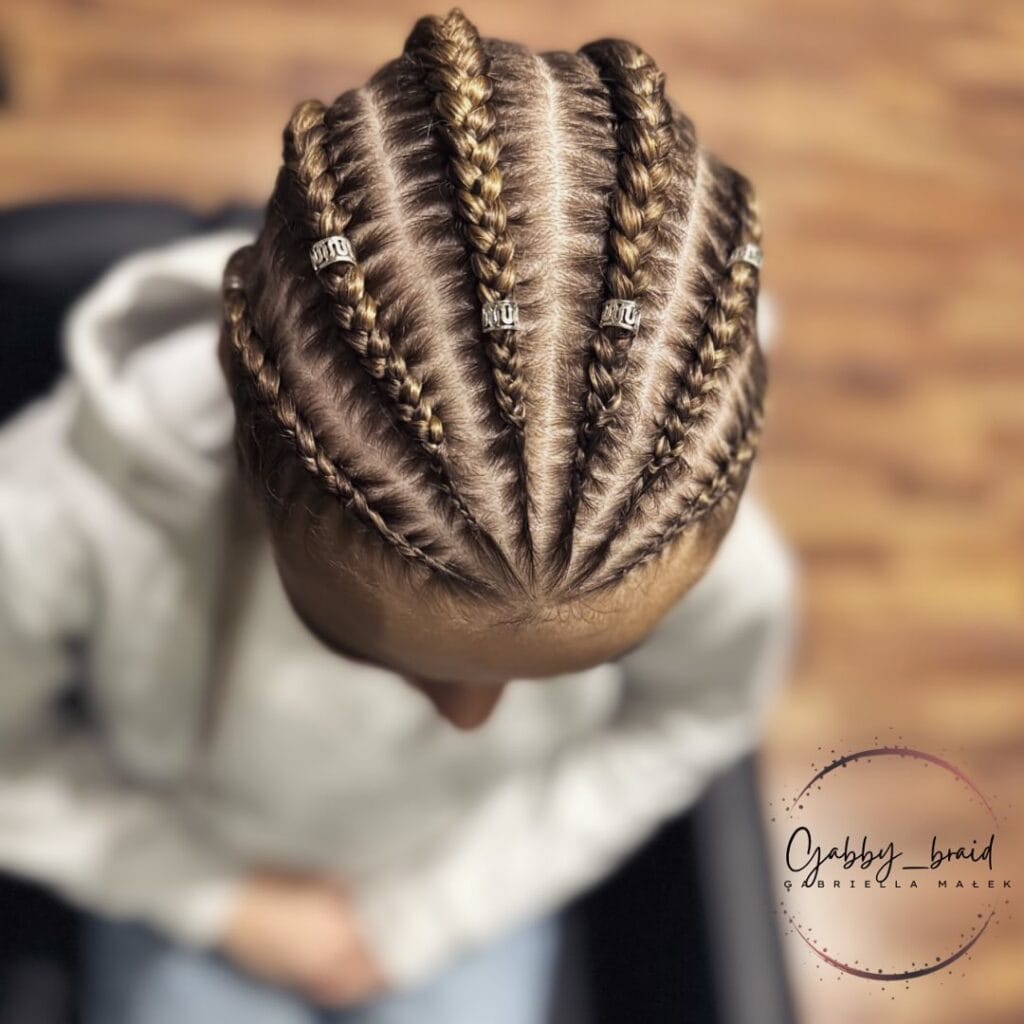 Thick cornrow braids arranged in evenly spaced rows across the scalp.