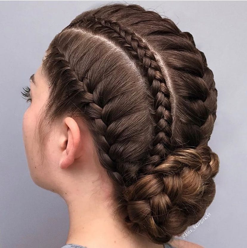 Braided crown hairstyle styled into a neat low braided bun.