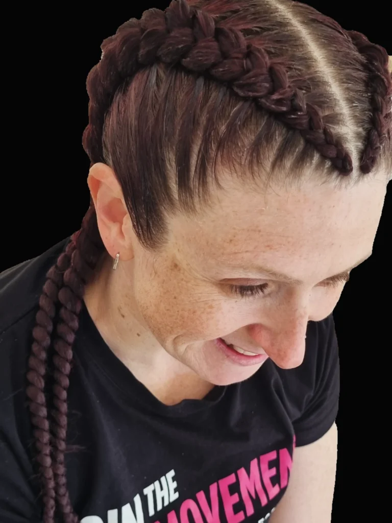 Two tight braids parted at the center and braided down the back.