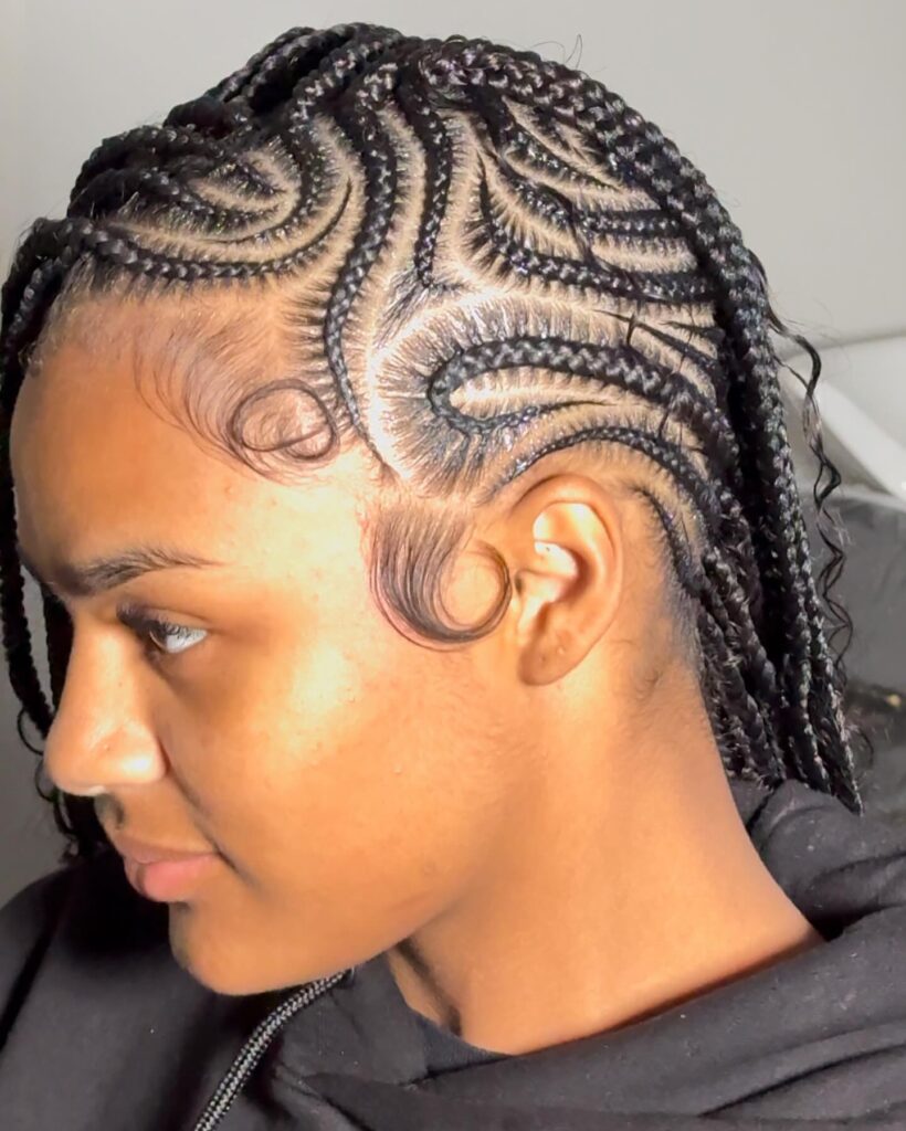 Short braided mohawk bob with sleek swirl cornrow patterns.