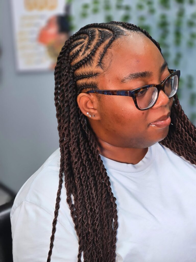 Small uniform twists with clean parting styled neatly along the shoulders.
