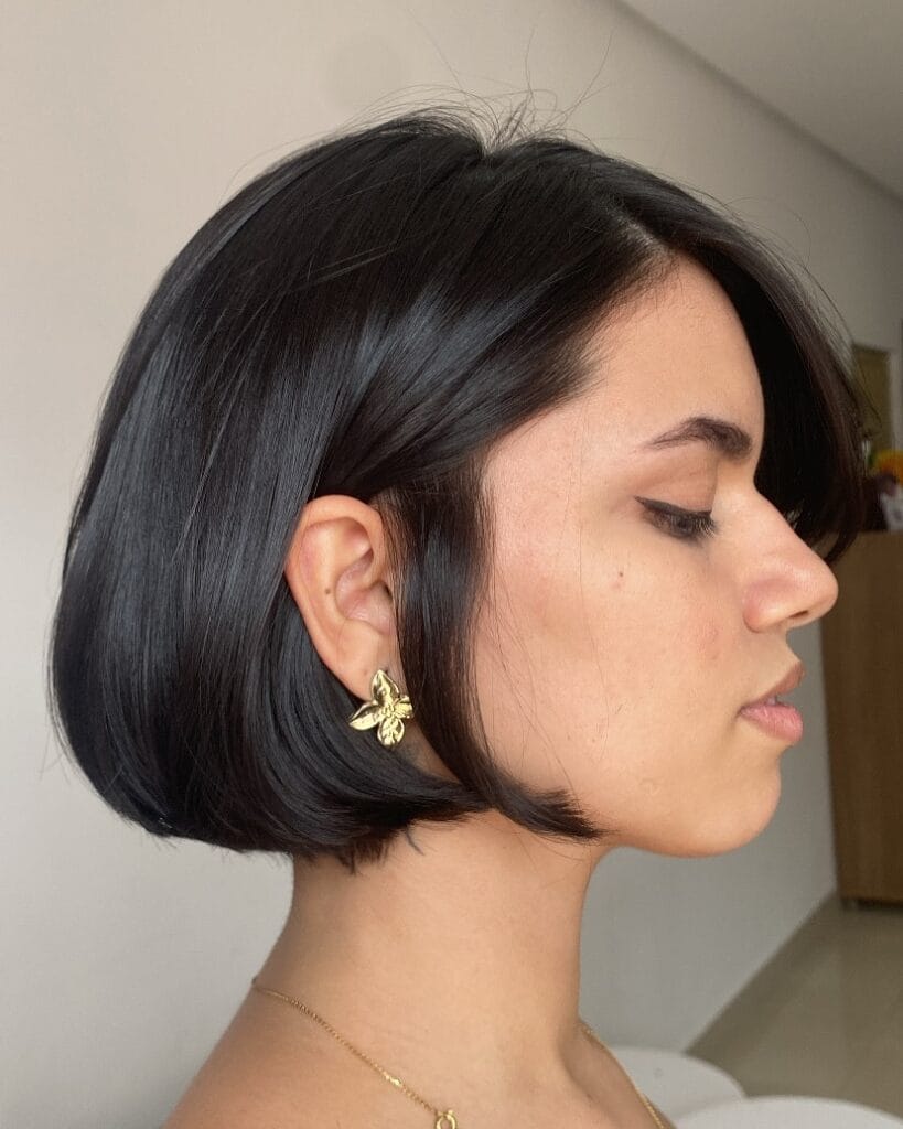 Sleek chin-length graduated bob with subtle layering and slightly longer front pieces that curve neatly toward the jaw.