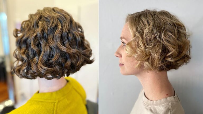 A short layered curly bob with soft blonde and light brown tones, styled with loose defined curls and natural volume.