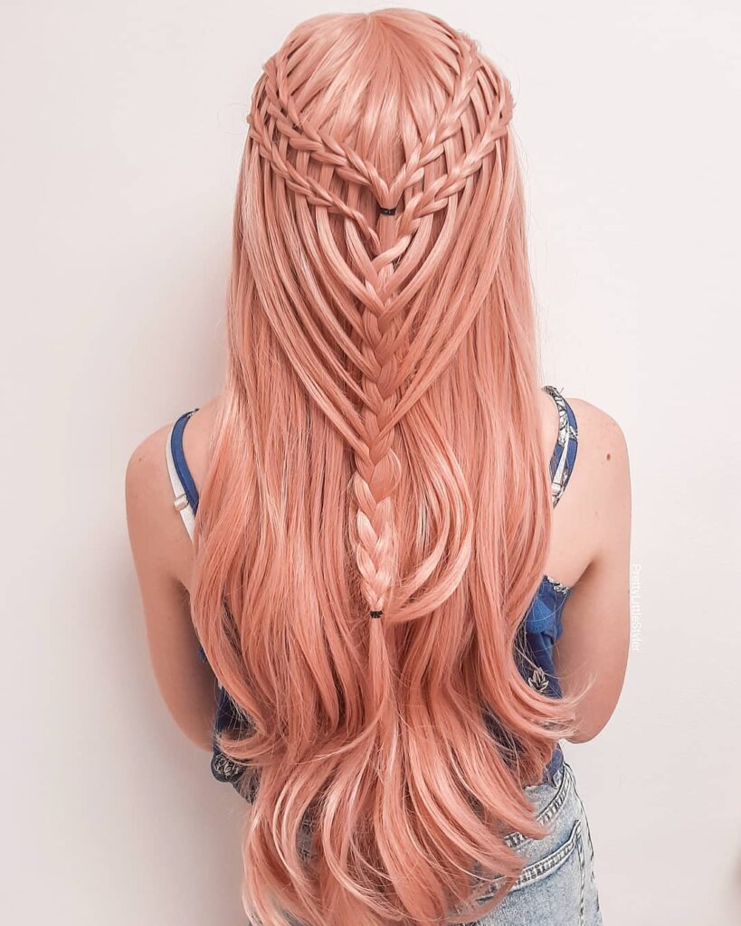 A back view of long, straight peach-colored hair featuring an intricate double waterfall braid that transitions into a central mermaid-style plait.