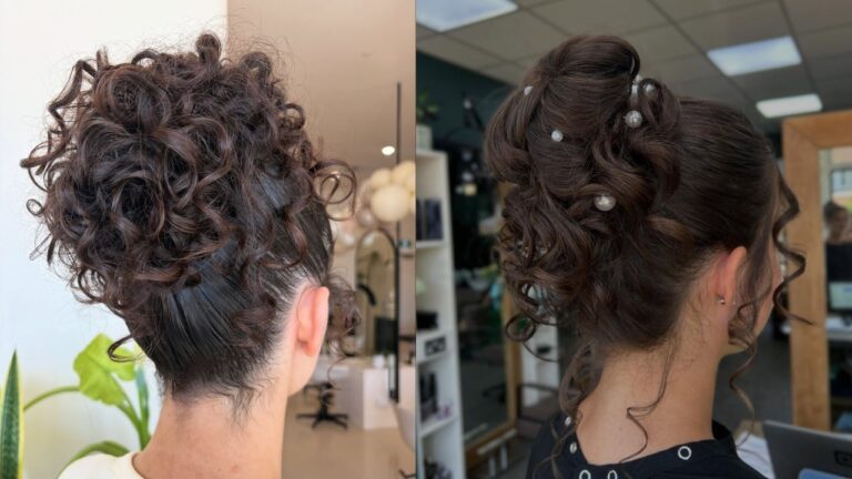 A voluminous curly updo for long hair with defined ringlets piled high, soft tendrils left out around the neck and face for a romantic finish.
