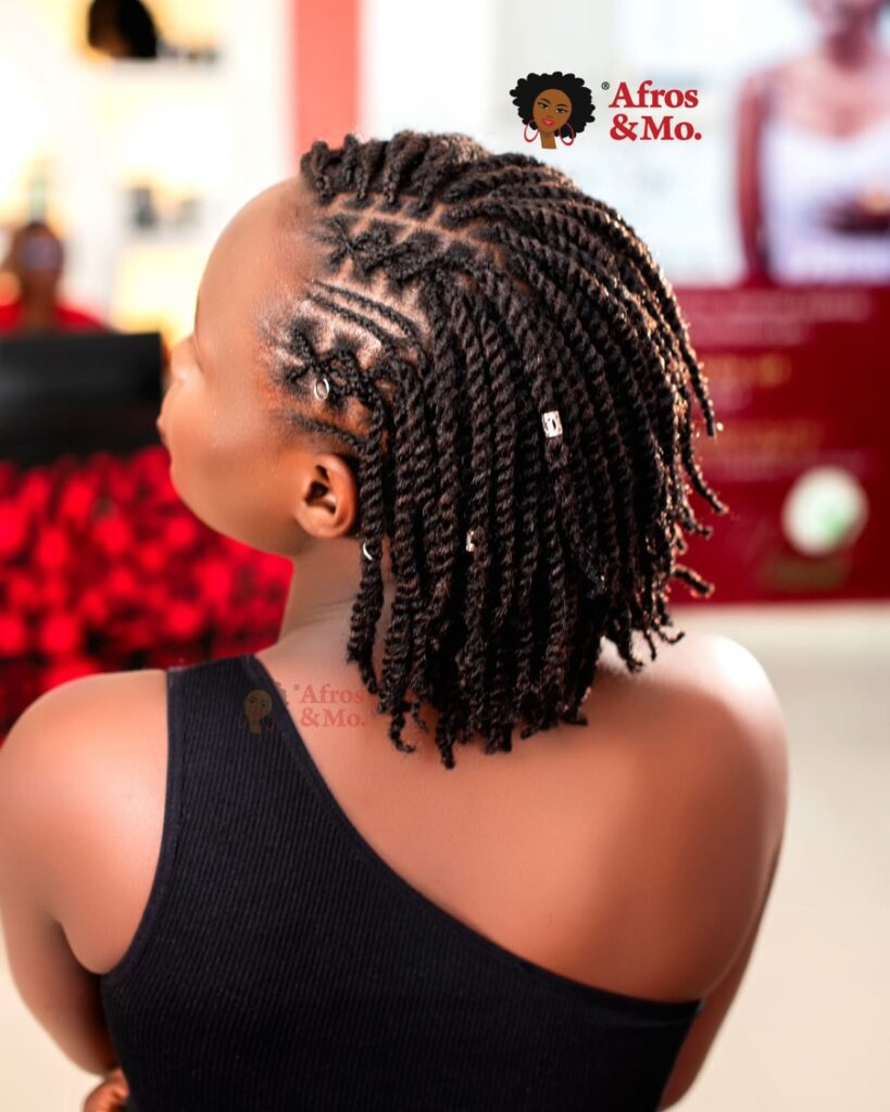 Short twisted bob hairstyle with defined parts and chunky twists.