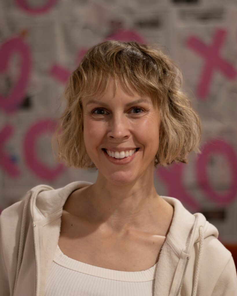 Short blonde bob with soft texture and wispy fringe creating a light airy look.