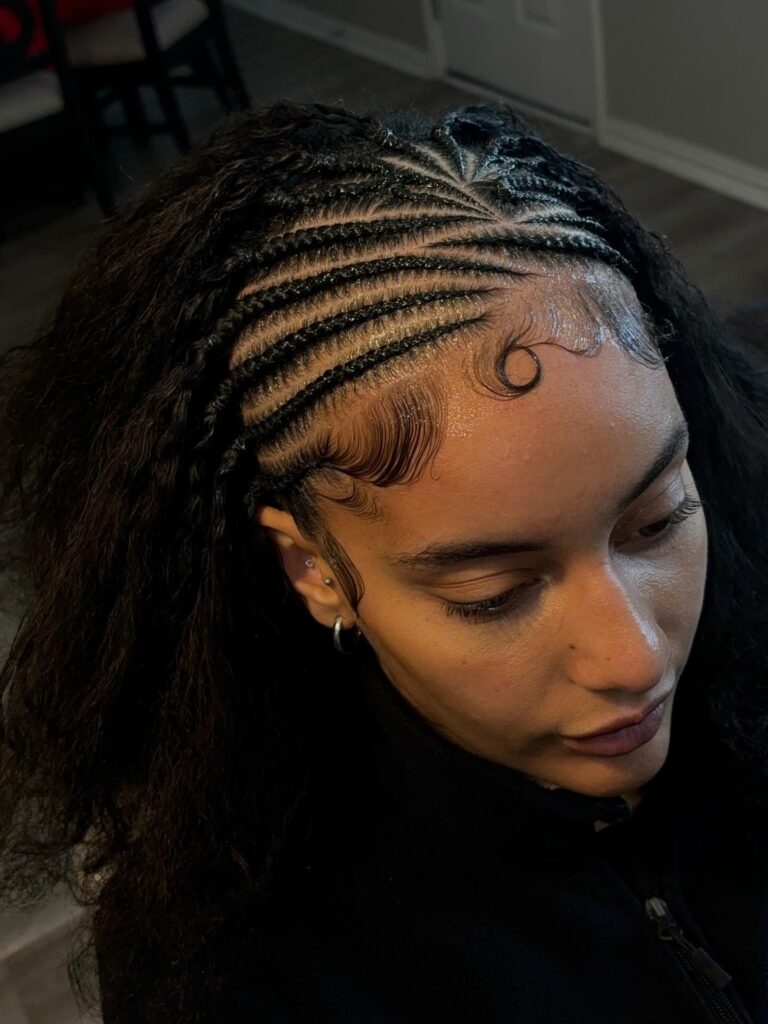 Front cornrows with loose natural textured hair left out at the back