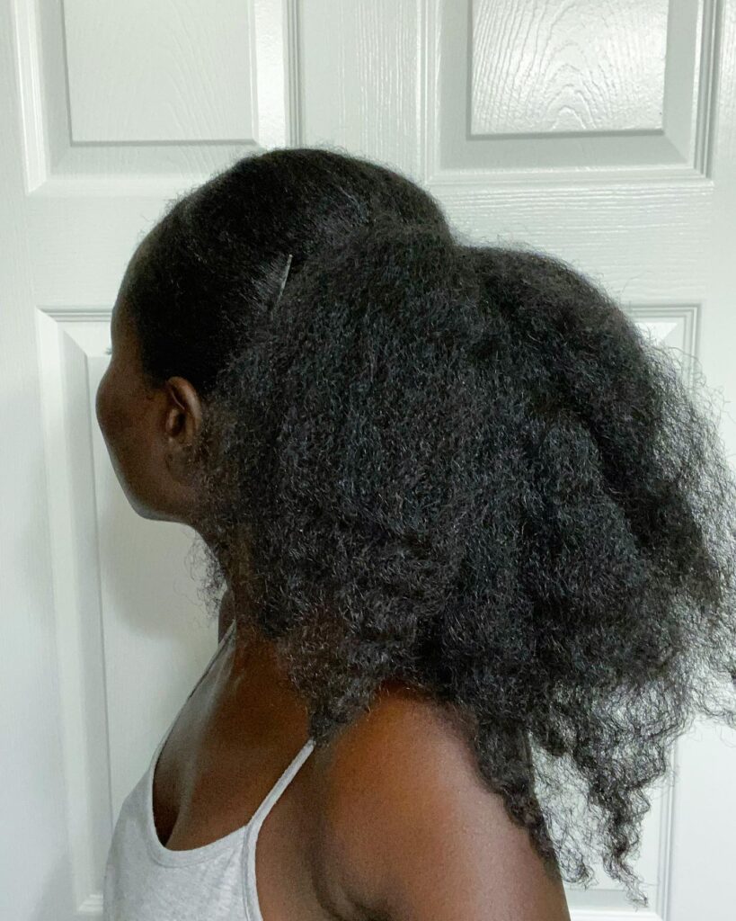 Soft sleek ponytail with a smooth base and a full natural textured ponytail.