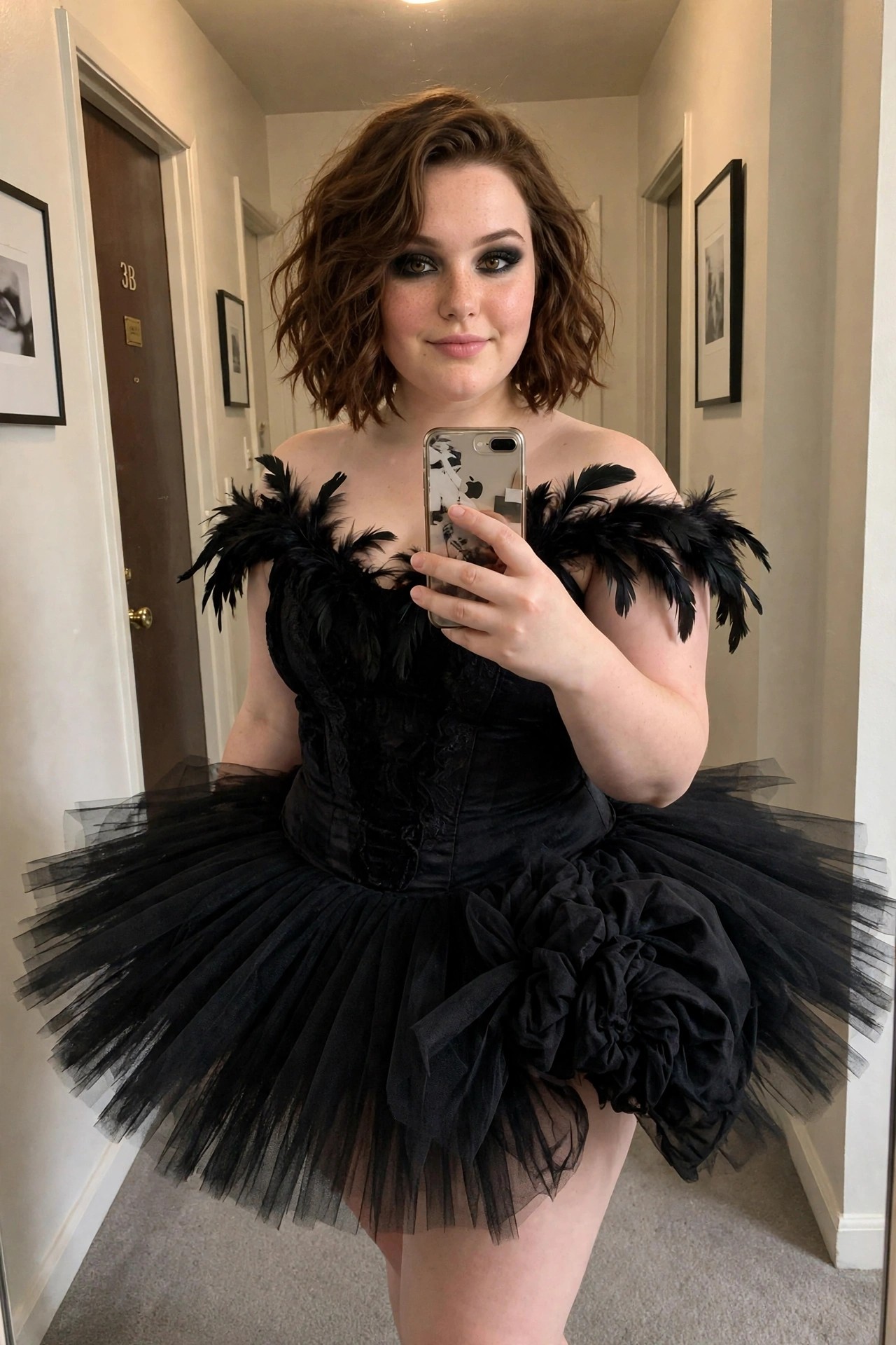 Plus size woman wearing a black feathered corset top and voluminous black tulle tutu skirt with a large side bow in a hallway mirror selfie.